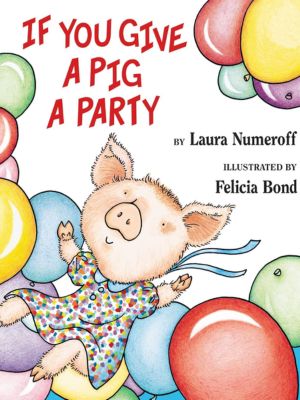 cute little pig in a dress playing in a pile of colorful balloons