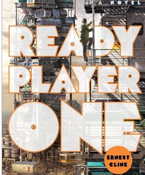 RV's piled up on one another with boy climbing them all 