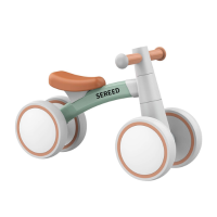 child's bike with large wheels