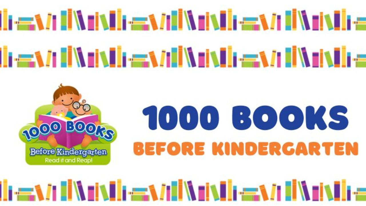 colorful books and happy child reading a book
