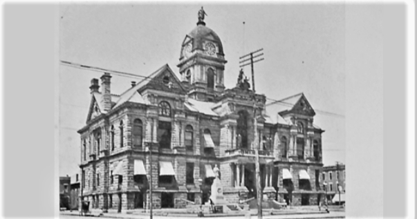 old building with John Hancock statue on top