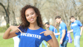 Girl with blue volunteer t shirt on